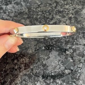 EUC henri Bendel silver bracelet with gold/rhinestone studs